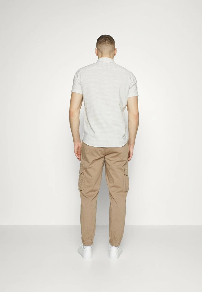 JOSIAH PANTS - Cargo trousers - fungi