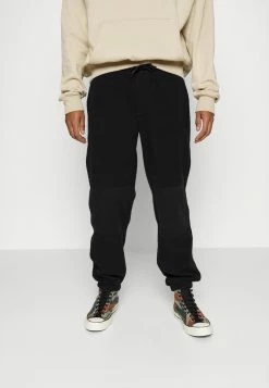 Redefined Rebel ASHER PANTS UNISEX - Tracksuit Bottoms - Black
