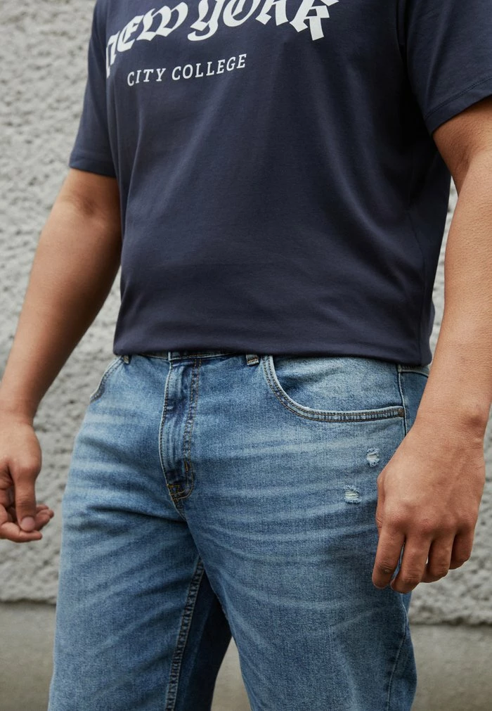 STOCKHOLM DESTROY - Jeans Tapered Fit - hollywood worn