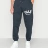 Redefined Rebel RONALD PANTS UNISEX - Tracksuit Bottoms - Navy