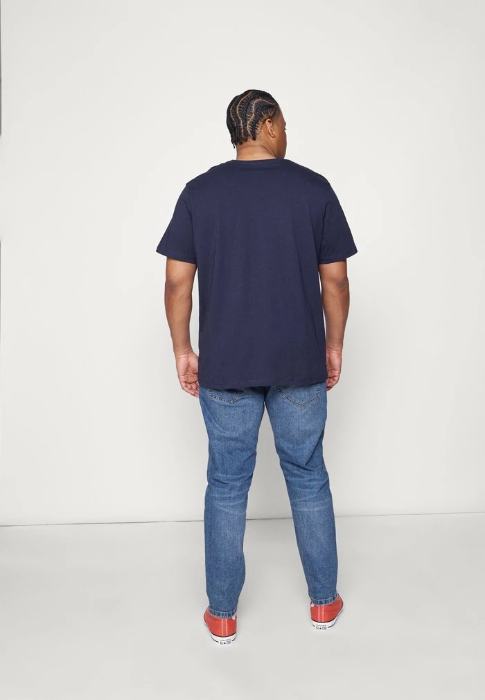 STOCKHOLM DESTROY - Jeans Tapered Fit - hollywood worn